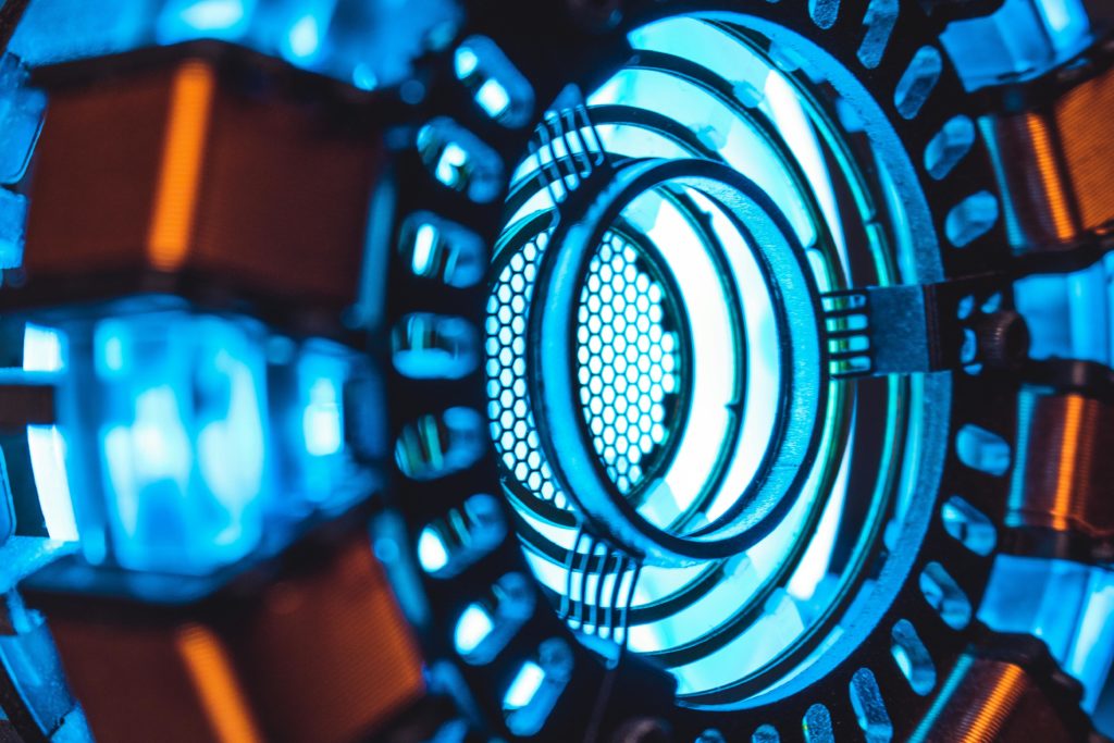 pexels-photo-9962888-9962888 A detailed close-up of a glowing blue technology component with intricate designs.